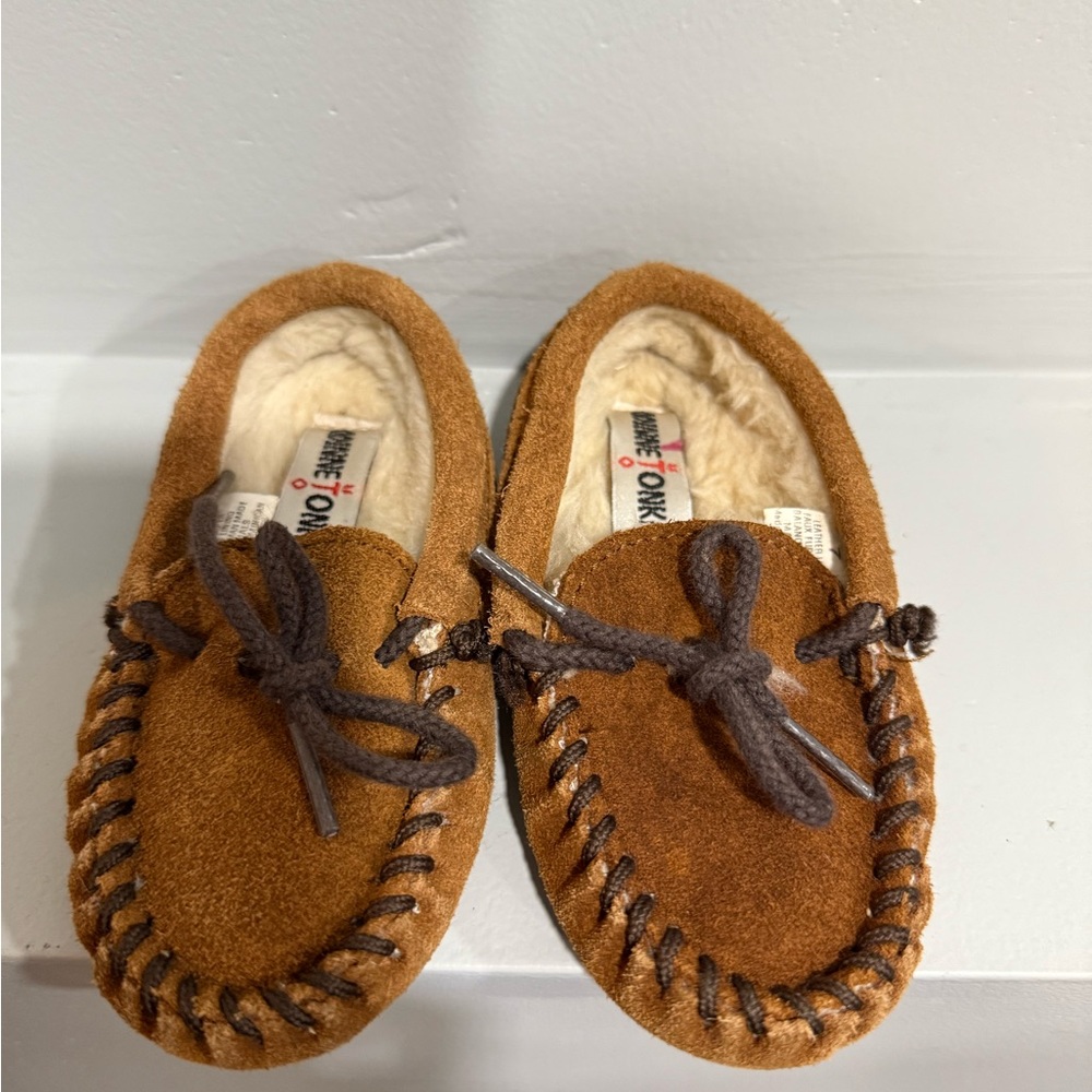 Infant size 7 Minnetonka slippers